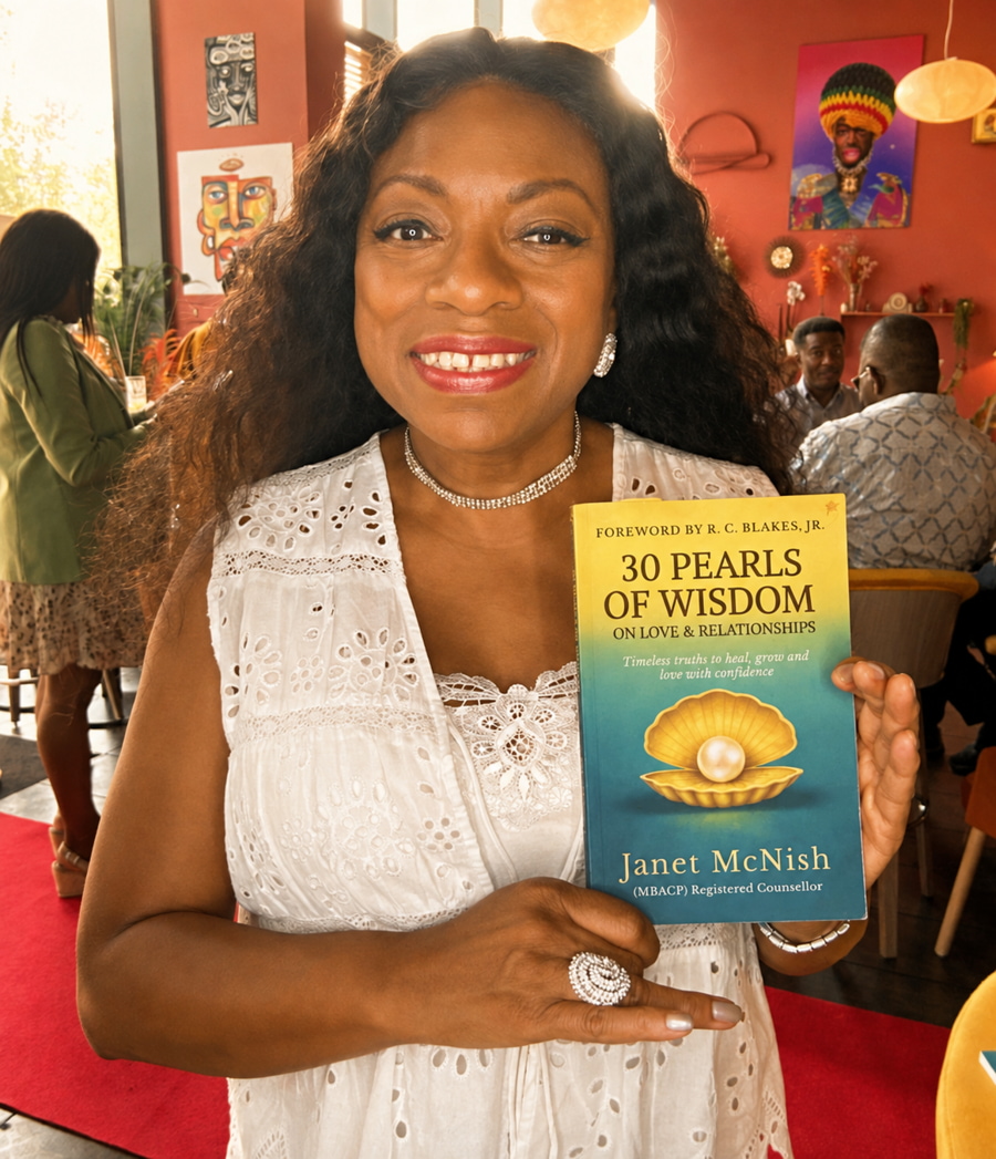 janet mcnich with book 30 pearls of wisdom